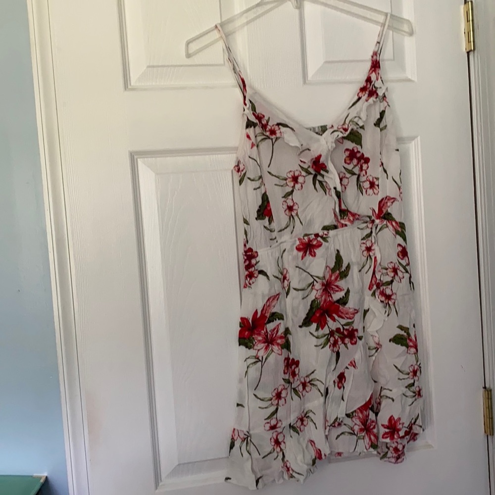 Patterned spaghetti strap mini dress. Size medium.